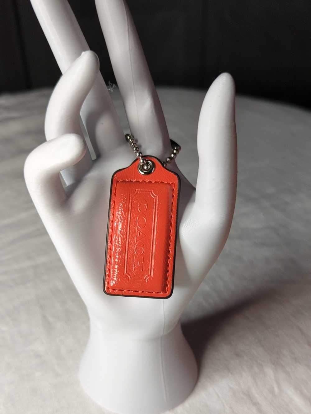 (0012) Coach Orange Leather Hang Tag with Silver Ball Chain